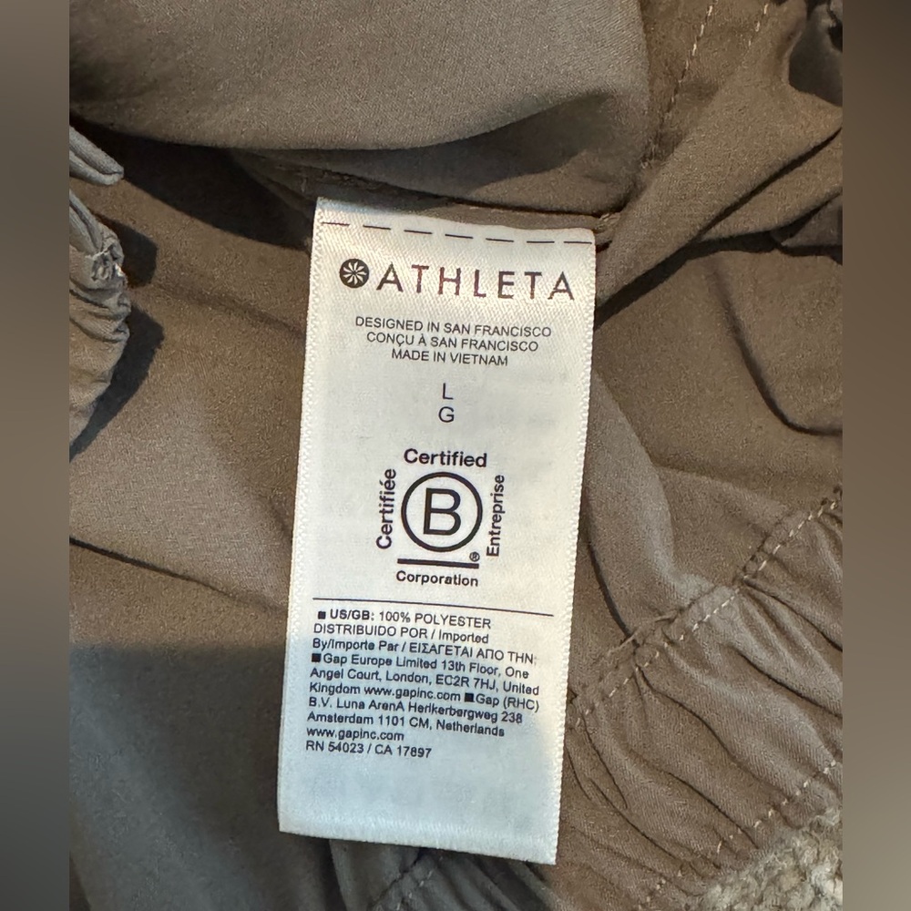 Athleta Midday Bubble Hem Shirt
Sz L Cropped button-down - Picture 6 of 7